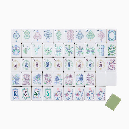 Immerse yourself in delicate chinoiserie charm with this Pagoda Garden American mahjong set. Soft‑toned tile faces showcase elegant pagoda architecture, lush peony floral illustrations, whimsical elephant‑themed jokers, festive lion‑dance motifs and hand‑drawn styled suit patterns. Distinct multi‑layer olive‑green, mustard‑yellow and navy stacked tile backs deliver a warm, earth‑toned premium look.