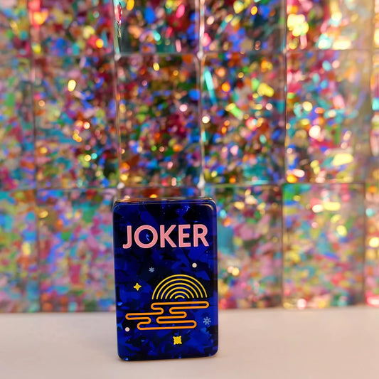 Scattered Confetti Sapphire American mahjong tiles on white background, deep blue resin tiles with embedded rainbow confetti flakes and bright neon pop art graphics