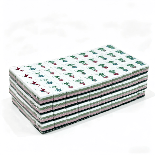 32g weighted Emerald Garden American Mahjong tiles by USA Mahjong Co., with translucent jade-green backs and detailed faces.