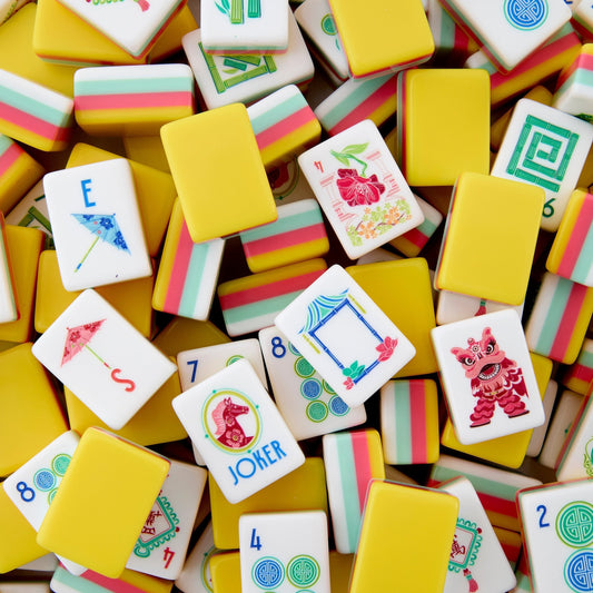 Infused with bright joyful folk‑art energy, this American mahjong set features vivid sunny‑yellow solid backs paired with cheerful multi‑color striped side edges. Crisp ivory tile fronts are decorated with refreshing water‑color style illustrations: playful lion‑dance figures, decorative paper‑umbrella wind tiles, elegant lotus blossoms, cranes, tassel‑ornamented wan tiles and traditional pavilion details.