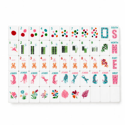 Leopard Bloom mahjong full flat‑lay layout, complete 160‑tile modern white set, colorful polka‑dot dot tiles, green bamboo with pink flamingo one‑bamboo, orange character tiles, polka‑dot winds, green & pink dragons, pink & teal leopard jokers and botanical flower tiles, American mahjong set