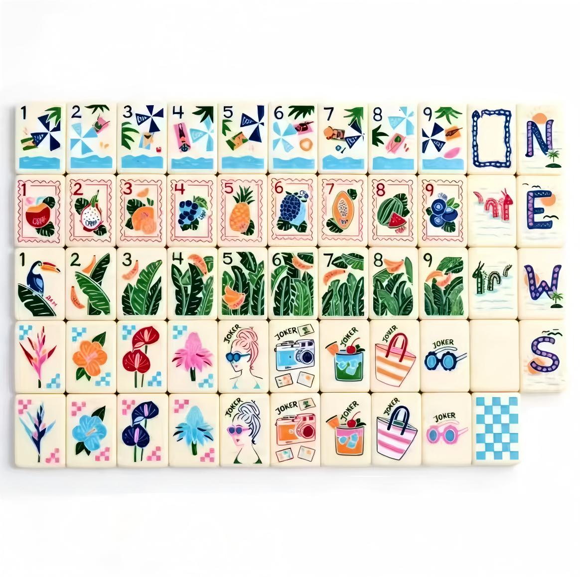 Tropic Getaway Mahjong Tiles Set — Cream‑ivory base tiles decorated with tropical fruits, toucan birds, palm foliage, hibiscus flowers and retro tourist jokers, American mahjong 160‑tile set