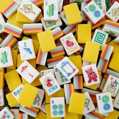 Sunny Lotus Mahjong Tiles Set – Sunny‑yellow backs with multi‑color striped sides, ivory fronts with lion dance, paper umbrella and water‑lotus folk‑art American mahjong tiles