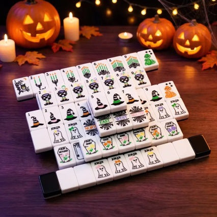 Spooky Hallow Mahjong Tiles Set — Solid black backs, white tile fronts decorated with ghost jokers, witch hats, magic cauldrons, owls, spider‑web winds and coffin‑floral Halloween‑themed American mahjong tiles