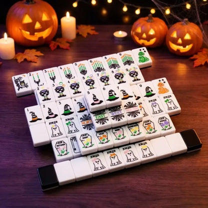 Spooky Hallow Mahjong Tiles Set — Solid black backs, white tile fronts decorated with ghost jokers, witch hats, magic cauldrons, owls, spider‑web winds and coffin‑floral Halloween‑themed American mahjong tiles