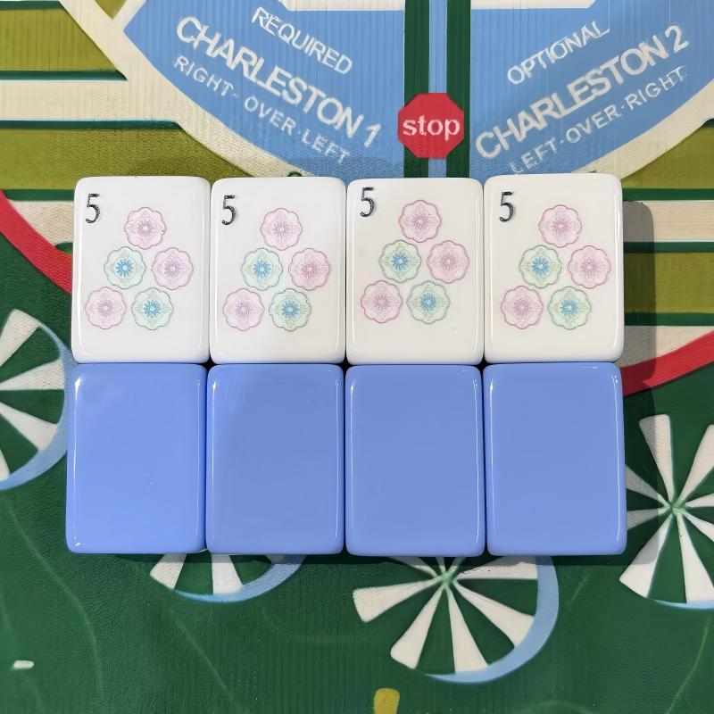Lotus Lantern Mahjong Tiles Set — Glossy multi‑layer light‑blue backs, white tile faces with lantern‑styled characters, pastel florals, palm‑tree bamboos and decorative mask jokers, full 160‑tile American mahjong set