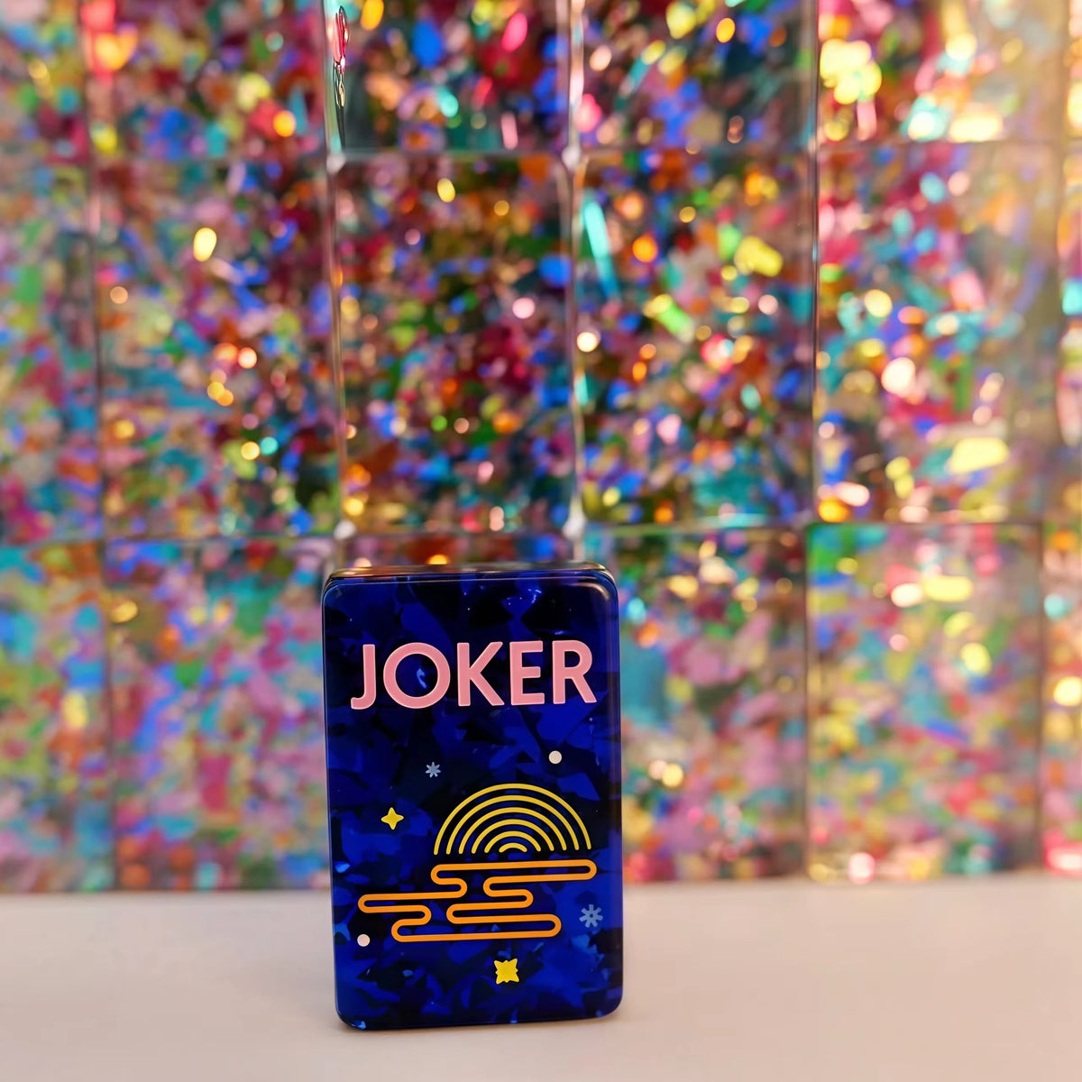 Scattered Confetti Sapphire American mahjong tiles on white background, deep blue resin tiles with embedded rainbow confetti flakes and bright neon pop art graphics