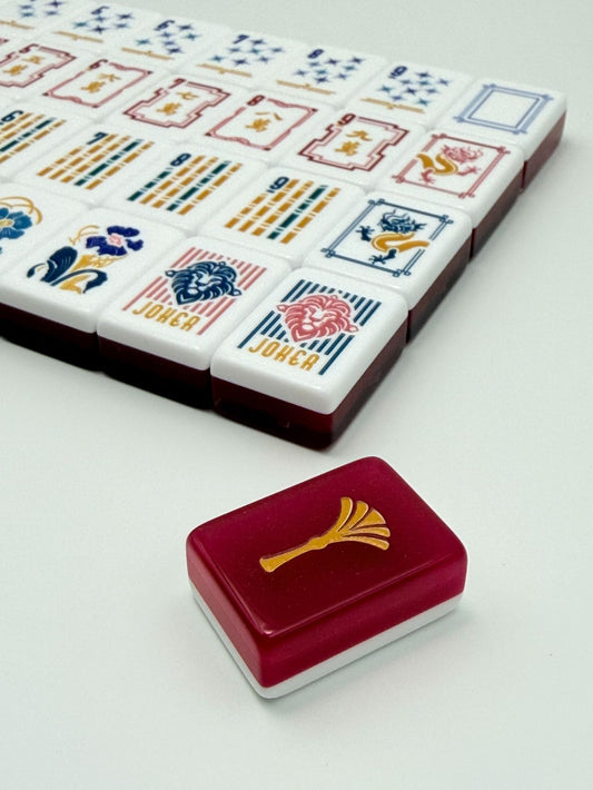 Crimson Lion Mahjong Tiles Set – Glossy Deep Burgundy Wine-Red Gold-Tassel Tile Backs with White Star-Sparkle Dot, Gold-Teal Bamboo, Red-Frame Character, Peacock-Feather Wind & Lion-Head Joker American Mahjong Suit Art