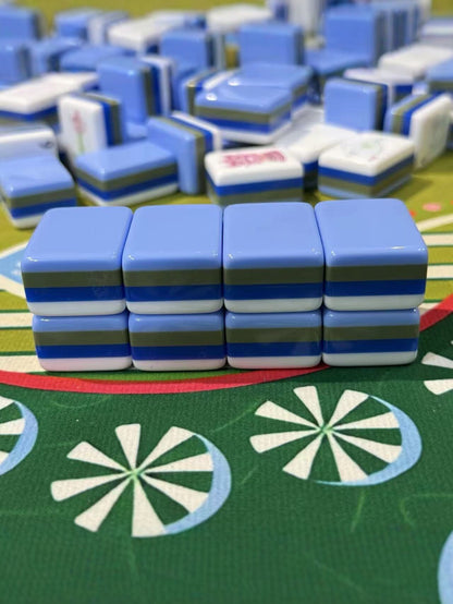 Lotus Lantern Mahjong Tiles Set — Glossy multi‑layer light‑blue backs, white tile faces with lantern‑styled characters, pastel florals, palm‑tree bamboos and decorative mask jokers, full 160‑tile American mahjong set