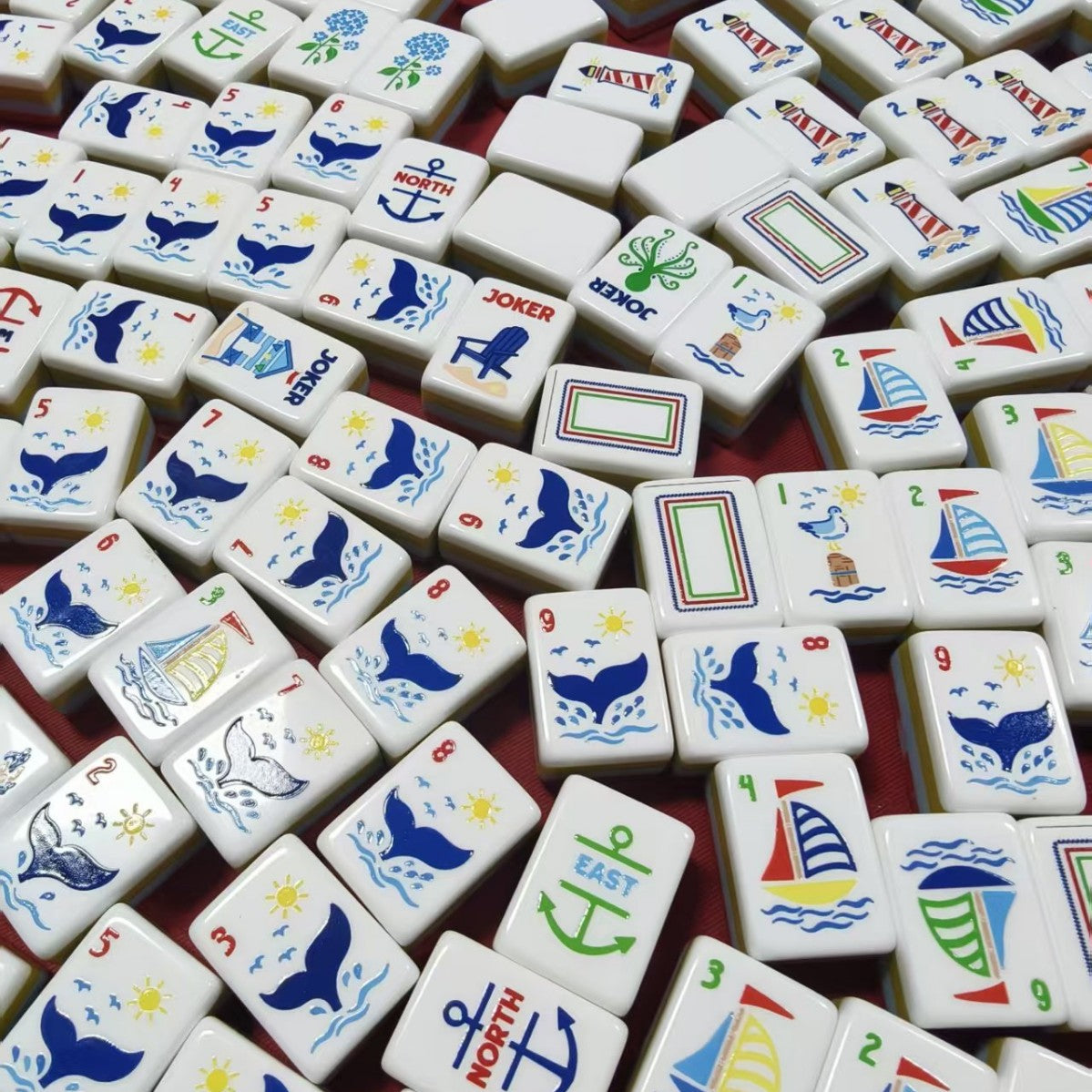 oastal_Breeze_Mahjong_Tiles_Set_Glossy_Orange_Summer-Striped_Tile_Backs_with_Nautical_Lighthouse_Dot_Whale-Tail_Bamboo_Sailboat_Character_Anchor_Wind_Beach-Vacation_Joker_American_Mahjong_Suit_Art