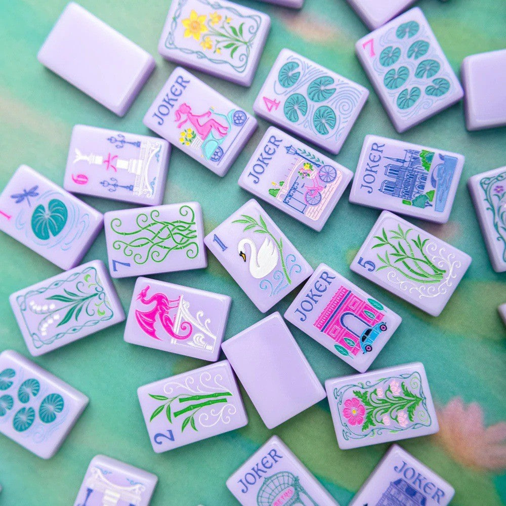 Lavender Parisian Mahjong Tiles Set — Soft pale lavender American mahjong tiles with hand‑drawn Paris landmark jokers, lily‑pad dots, botanical bamboo and vintage French romantic illustrations, 166‑tile tournament set