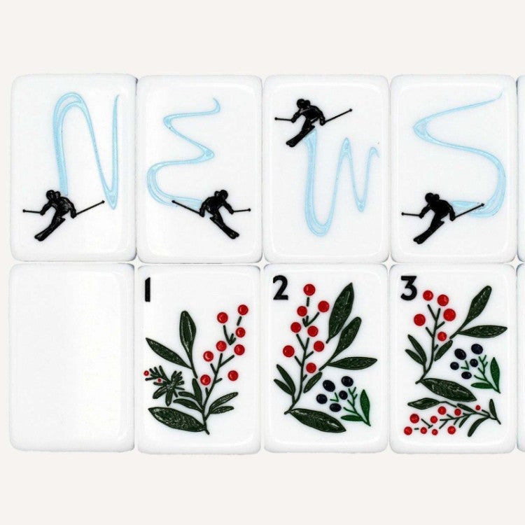Frosty Peak mahjong wind and seasonal tiles close‑up, downhill skier wind tiles, winter berry floral tiles, winter alpine artwork, custom American mahjong tile details