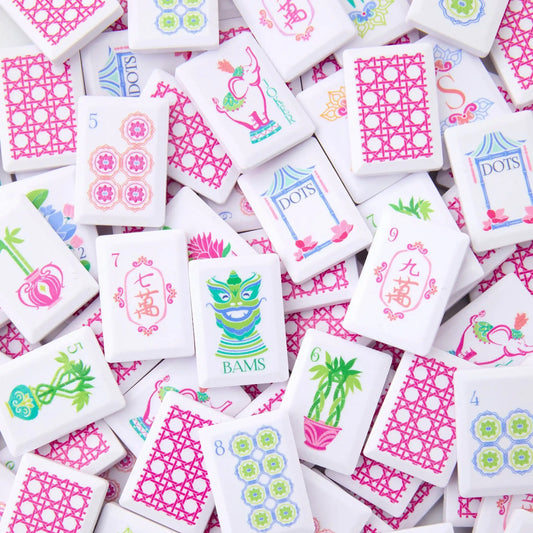Tropical Paradise mahjong mixed tile close‑up, elephant joker, mask dragon, floral dot tiles, plant bamboo tiles and script character tiles, pink lattice tile backs visible