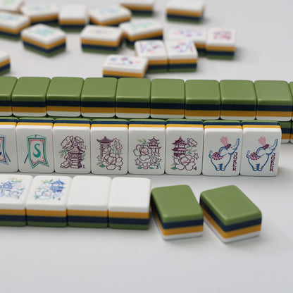 Pagoda Garden mahjong full flat‑lay tile layout, complete set display, dot, bamboo, character suits, pagoda peony seasons, elephant jokers, lion‑dance tiles, chinoiserie custom American mahjong 160 pieces
