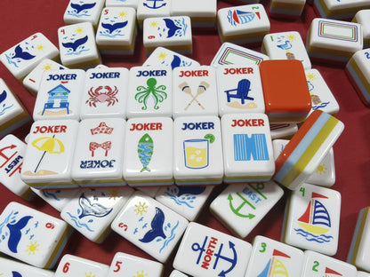 oastal_Breeze_Mahjong_Tiles_Set_Glossy_Orange_Summer-Striped_Tile_Backs_with_Nautical_Lighthouse_Dot_Whale-Tail_Bamboo_Sailboat_Character_Anchor_Wind_Beach-Vacation_Joker_American_Mahjong_Suit_Art