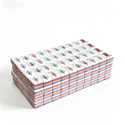 Close-up of Lavender Dream American Mahjong Set by USA Mahjong Co. with detailed engravings and purple backs