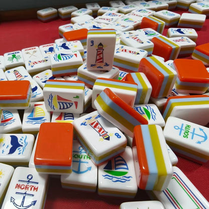 oastal_Breeze_Mahjong_Tiles_Set_Glossy_Orange_Summer-Striped_Tile_Backs_with_Nautical_Lighthouse_Dot_Whale-Tail_Bamboo_Sailboat_Character_Anchor_Wind_Beach-Vacation_Joker_American_Mahjong_Suit_Art