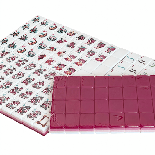 The Berry Sorbet American Mahjong Set by USA Mahjong Co., featuring vibrant pink-red tiles with gold inlays.