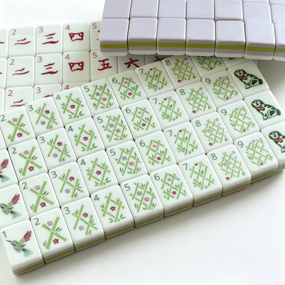 The Wisteria Bloom American Mahjong Set by USA Mahjong Co. with 166 soft purple tiles featuring gold and white inlays