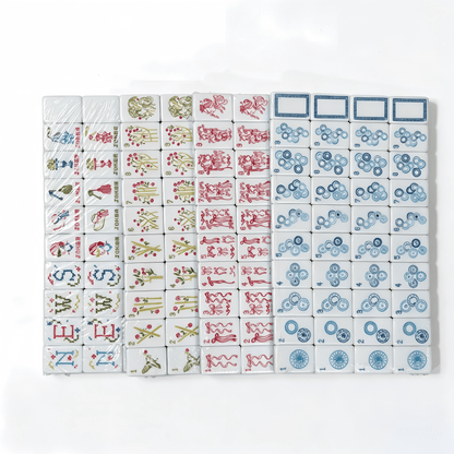 American Mahjong Set by USA Mahjong Co. with 160 linen-textured tiles featuring blue and white striped backs
