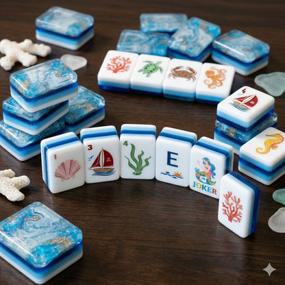 Coastal Mahjong Tiles Close-up - Seagull Sailboat Sea Turtle Seahorse and Tropical Wind Tiles on Sandy Background