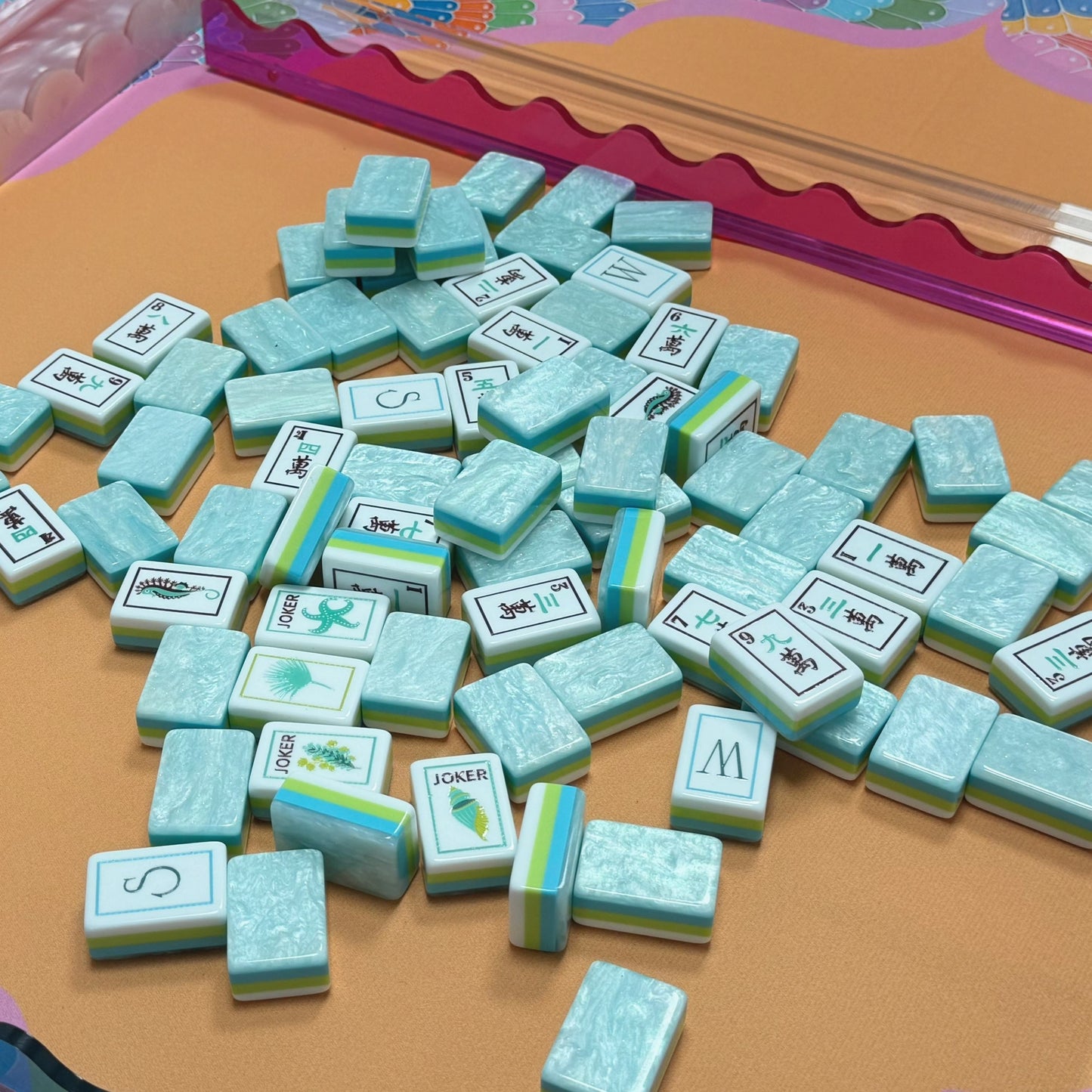 Mint Acrylic Mahjong Tiles in Play - Ocean Joker Flamingo Flower and English Wind Tiles NMJL Standard