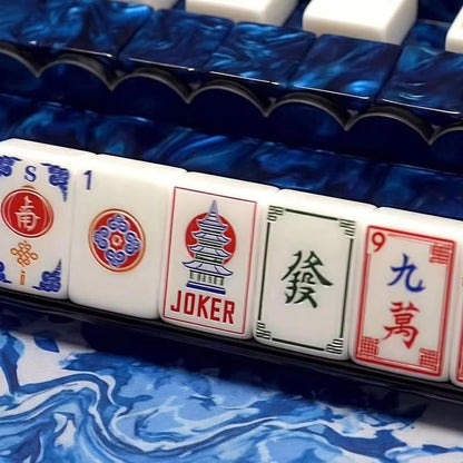 Sapphire Blue Mahjong Tiles in Play - Pagoda Joker South Wind and Dragon Tiles Heirloom Acrylic NMJL Set