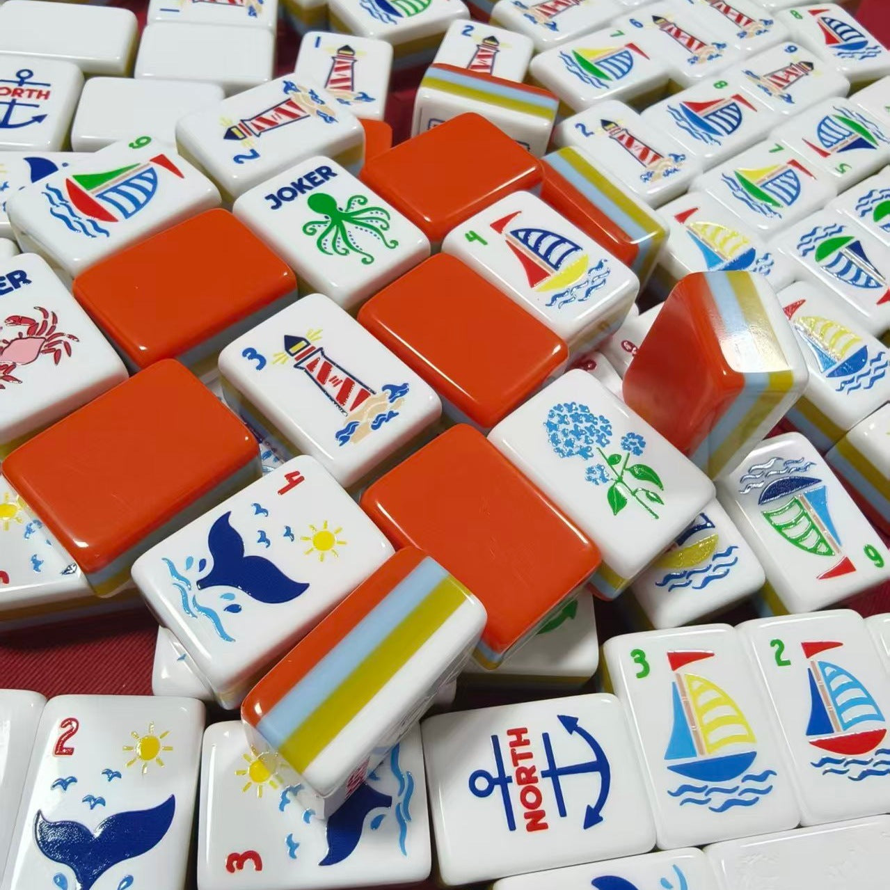 oastal_Breeze_Mahjong_Tiles_Set_Glossy_Orange_Summer-Striped_Tile_Backs_with_Nautical_Lighthouse_Dot_Whale-Tail_Bamboo_Sailboat_Character_Anchor_Wind_Beach-Vacation_Joker_American_Mahjong_Suit_Art
