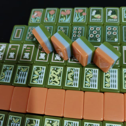 Retro_Harvest_Mahjong_Tiles_Set_Glossy_Burnt-Orange_Retro_Striped_Tile_Backs_with_Avocado-Green_Peacock-Eye_Dot