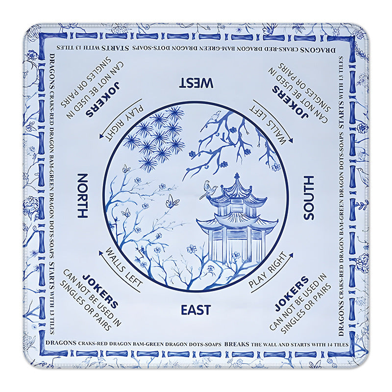 Blue and white porcelain style pagoda mahjong mat with wind directions and mahjong rules
