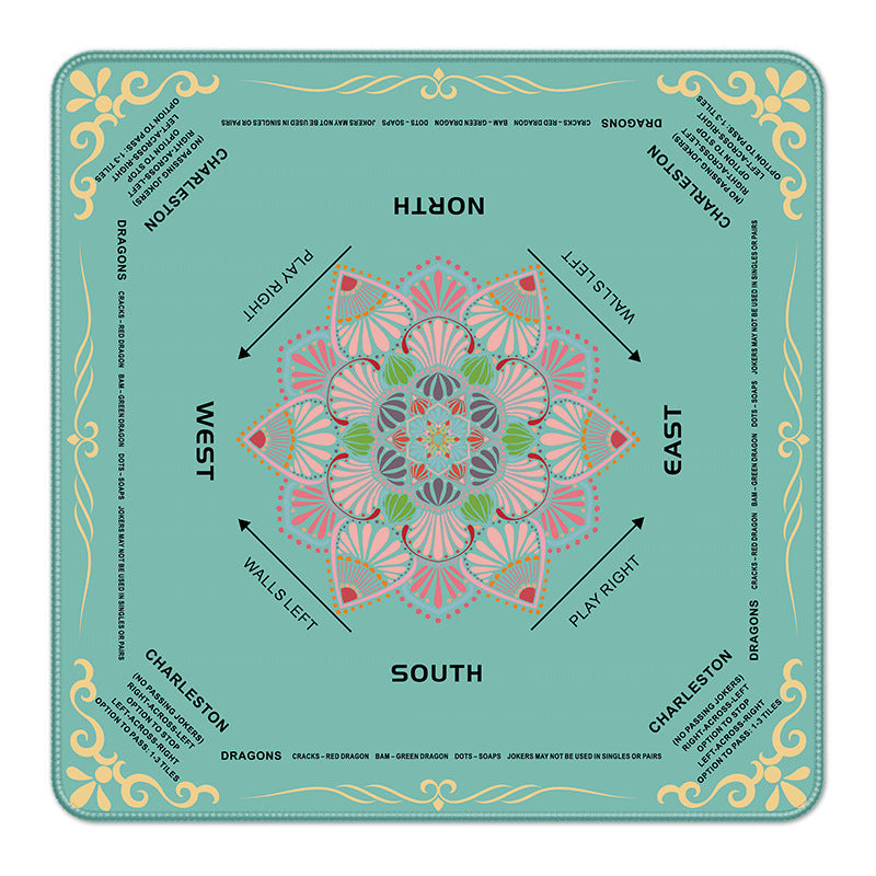 Mint green square American mahjong table mat with colorful pink mandala flower center, printed North South East West winds and Charleston game rules, gold decorative border
