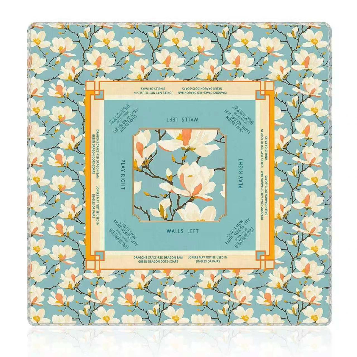 Vintage magnolia floral american mahjong table mat, turquoise background with white yulan magnolia blossoms, printed game direction and mahjong rule markers