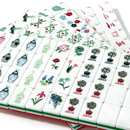 American Mahjong Set by USA Mahjong Co. with 166 weighted acrylic tiles featuring bold ruby red backs and Jokers.