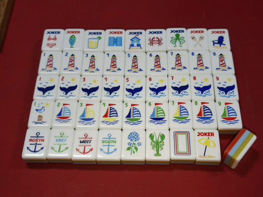 oastal_Breeze_Mahjong_Tiles_Set_Glossy_Orange_Summer-Striped_Tile_Backs_with_Nautical_Lighthouse_Dot_Whale-Tail_Bamboo_Sailboat_Character_Anchor_Wind_Beach-Vacation_Joker_American_Mahjong_Suit_Art