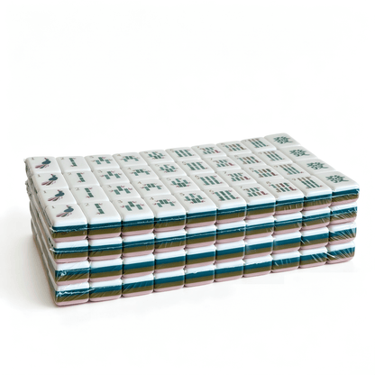 Dusty Rose American Mahjong Set tiles by USA Mahjong Co., featuring 32g weighted tiles with blush backs