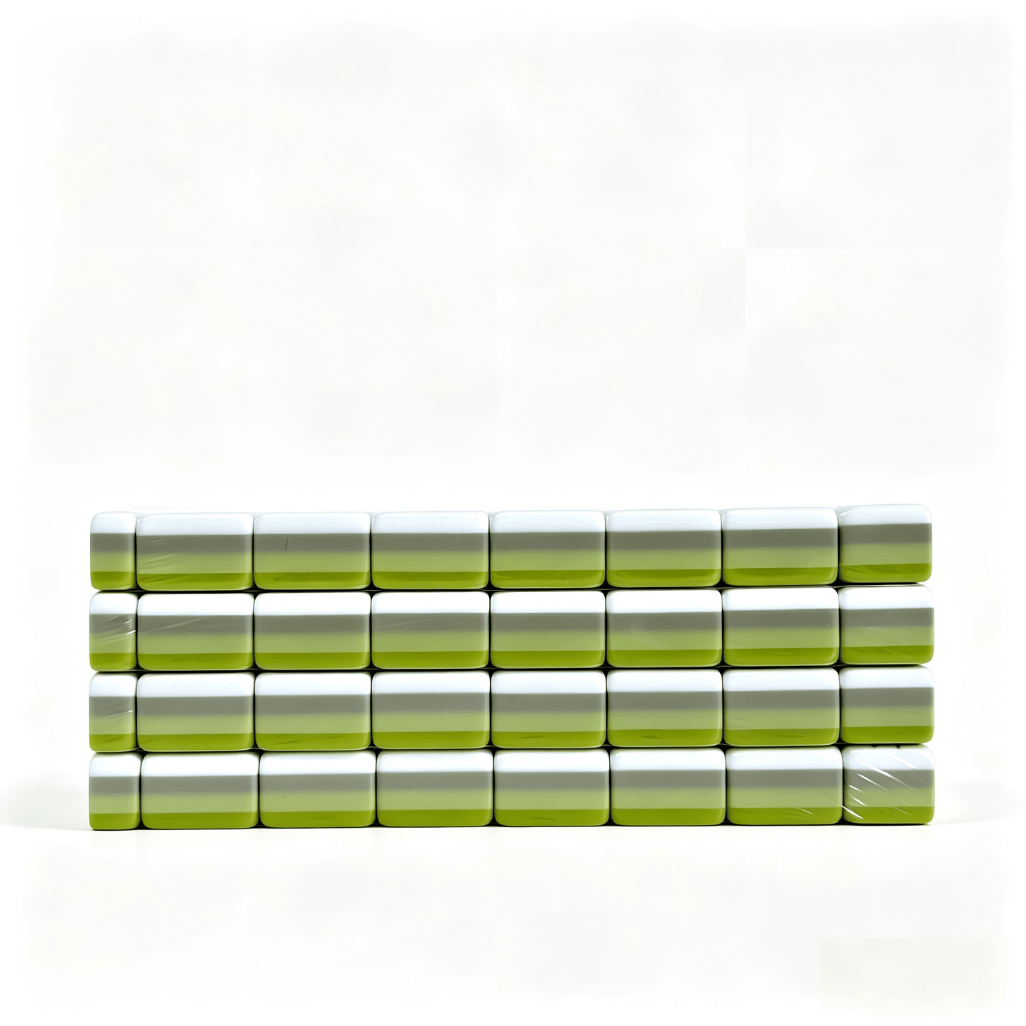 Side profile of 32g weighted Apple Mint Parfait American Mahjong set with green gradient acrylic tiles by USA Mahjong Co.
