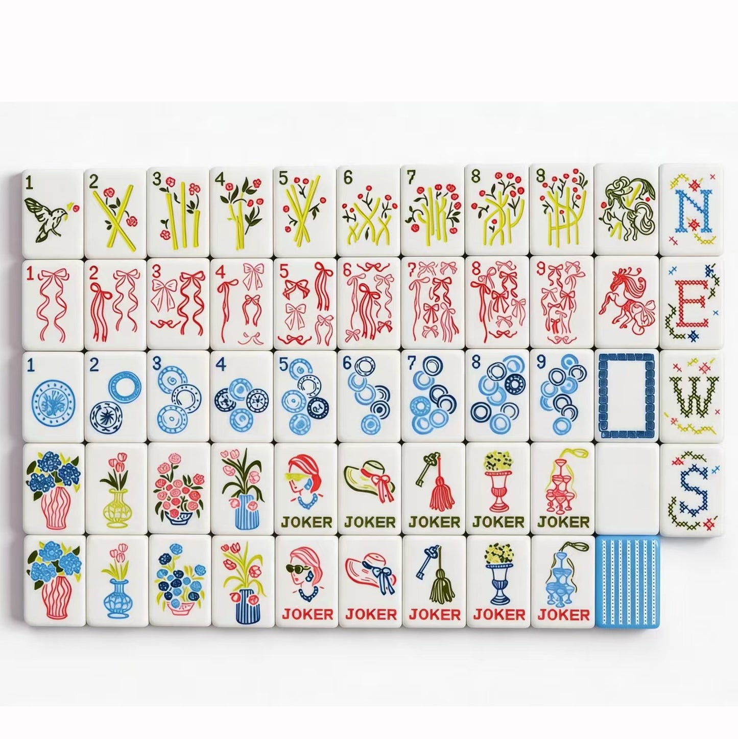 Side view of 32g blue-striped tiles from The Sky Linen American Mahjong Set by USA Mahjong Co., featuring weighted