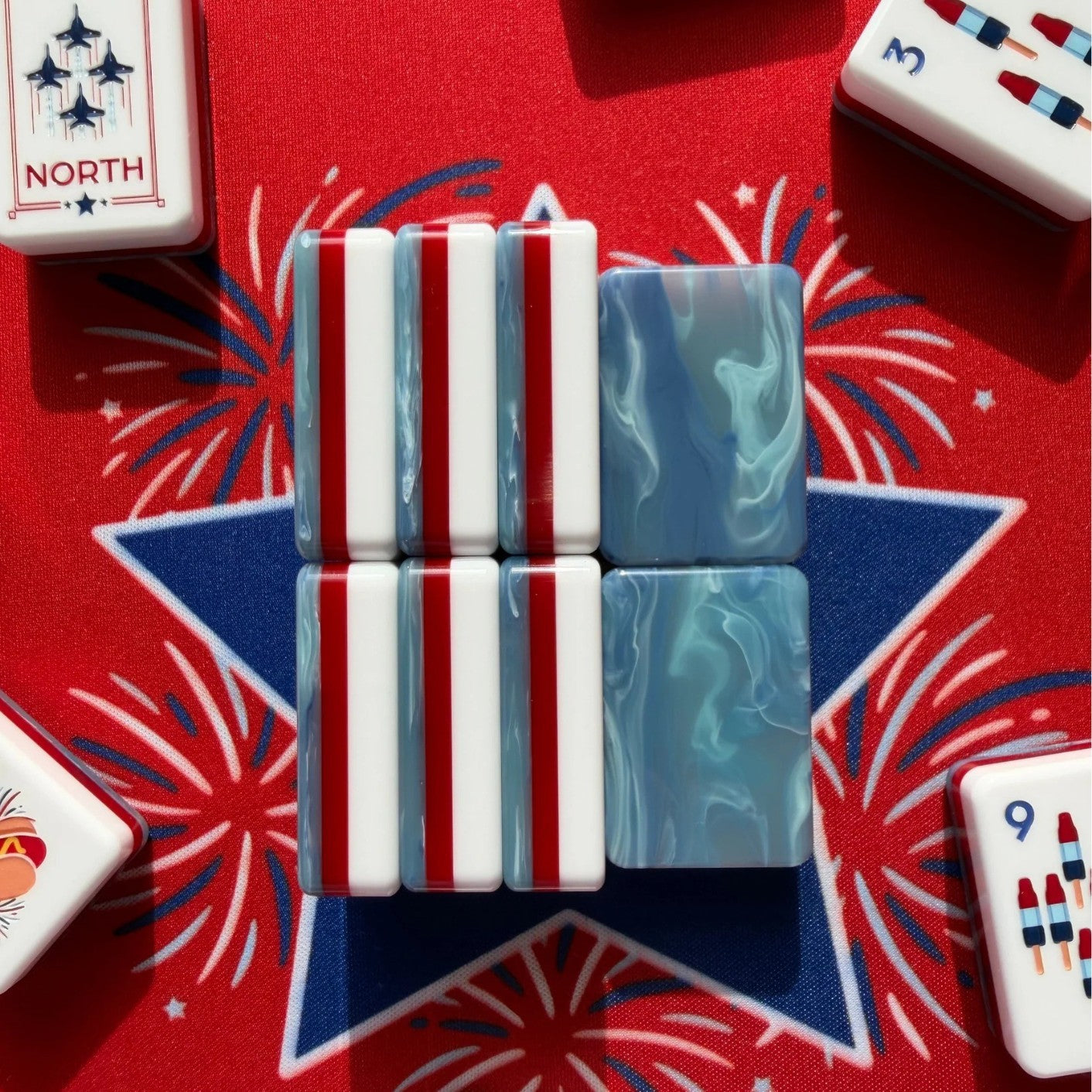 Stars_Stripes_Mahjong_Tiles_Set_Glossy_Light-Blue_Marble_Swirl_Red-White-Striped_Tile_Backs_with_Star-Spangled_Dot_Rocket-Pop_Bamboo_Firework_Character_Fighter-Jet_Wind_Uncle-Sam_Patriotic_Joker_American_Mahjong_Suit_Art