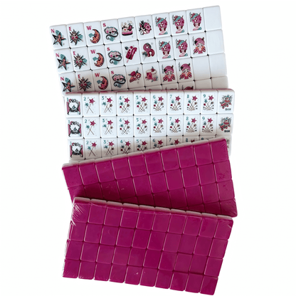 American Mahjong Set with 160 weighted tiles featuring deep magenta backs and playful candy design by USA Mahjong Co.