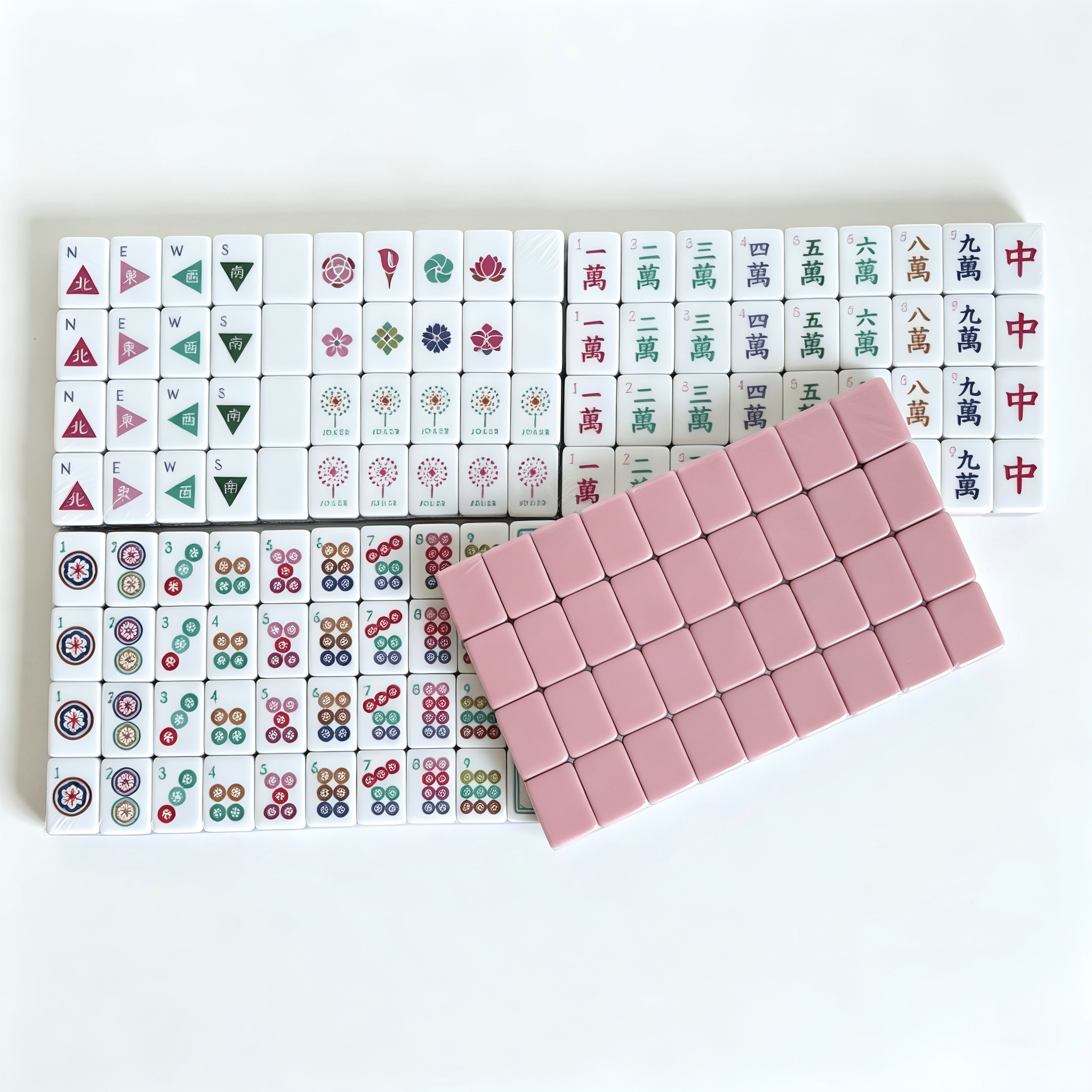 Blush Lotus dusty rose mahjong tile set ready for a four-player girls' night