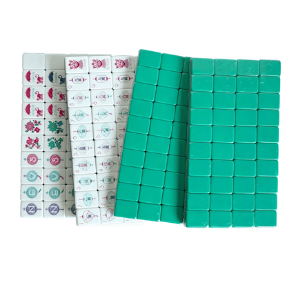 American Mahjong Set by USA Mahjong Co. featuring 160 teal-backed weighted tiles and monkey jokers in deep blue-green colors.