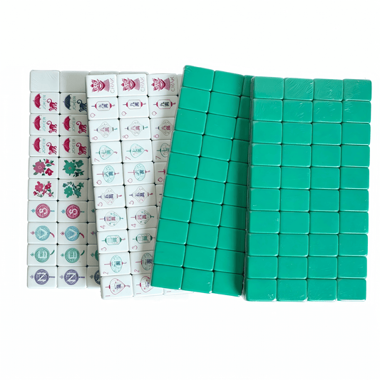 American Mahjong Set by USA Mahjong Co. featuring 166 teal-backed weighted tiles and monkey jokers in deep blue-green colors.