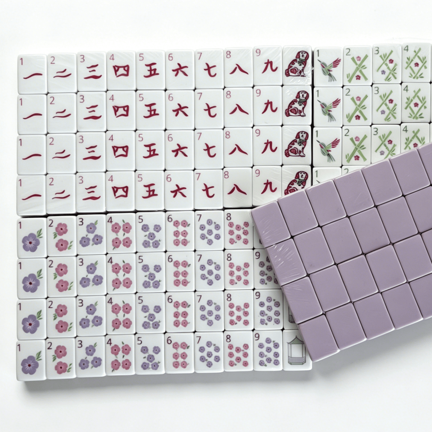 Modern American Mahjong Set by USA Mahjong Co. featuring 160 lavender-colored weighted tiles with soft lilac backs.