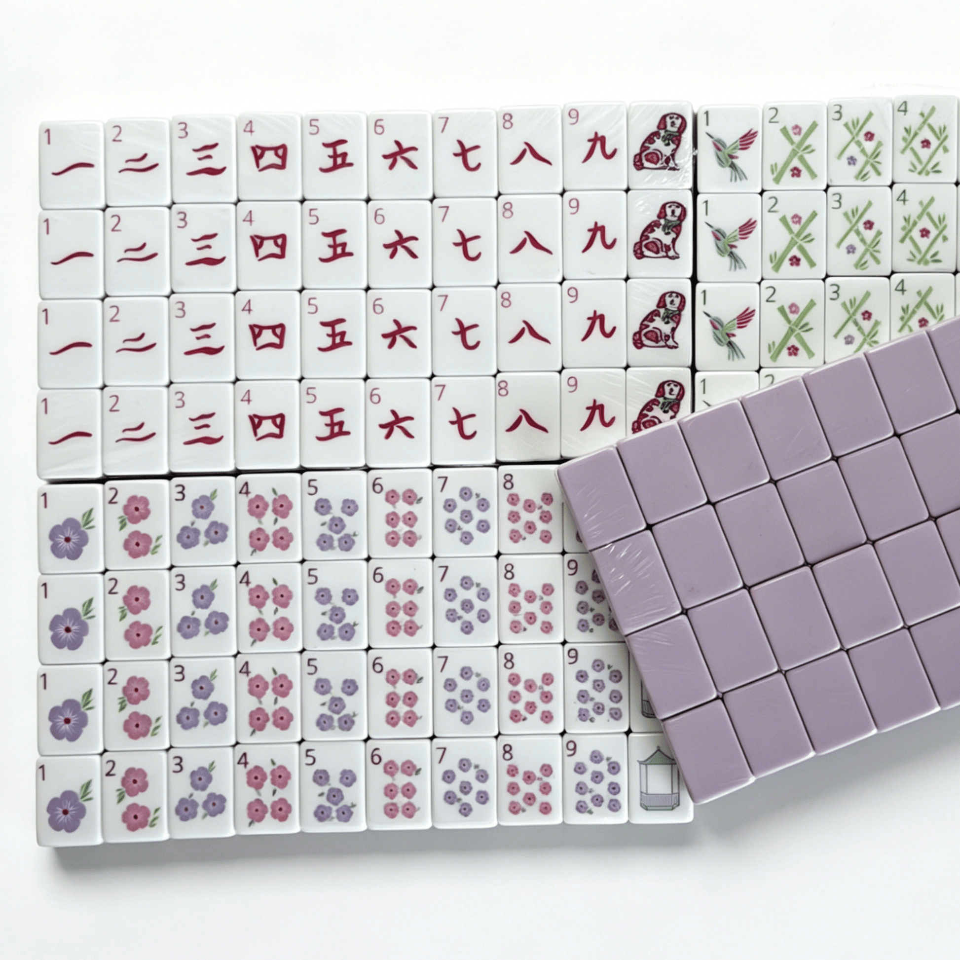 Modern American Mahjong Set by USA Mahjong Co. featuring 160 lavender-colored weighted tiles with soft lilac backs.