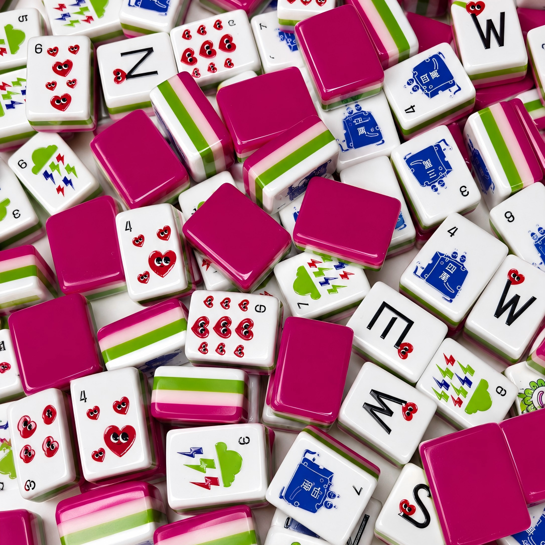 Overhead shot of scattered Heart & Lightning themed American mahjong tiles on plain white background, glossy hot pink backs, pink-white-lime green layered striped edges, white tile faces with red heart dot tiles, green lightning bamboo tiles, blue character tiles and heart wind tile accents