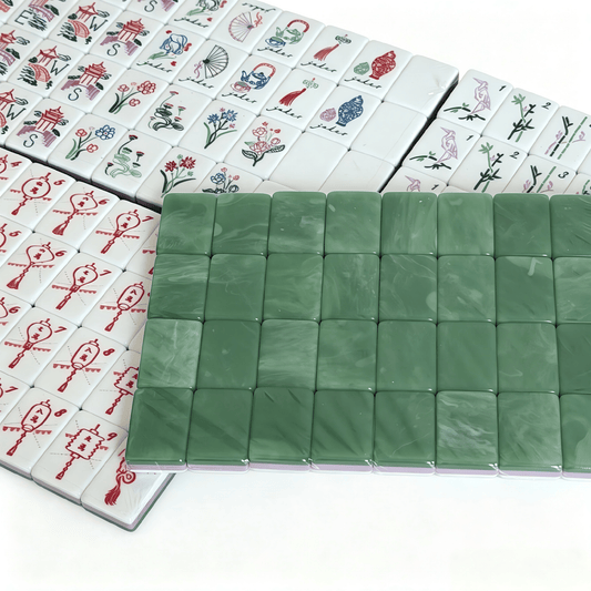 green acrylic Mahjong tiles with gold inlays from The Jade Lantern Heritage American Mahjong Set by USA Mahjong Co.